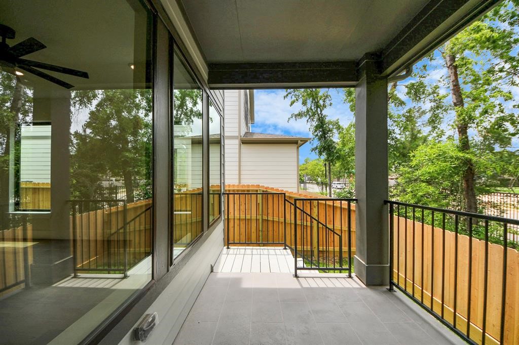 405 Forest Reserve Place Houston, TX 77079 - Photo 36 of 38 Enjoy the porch with views of lush greenery and trees