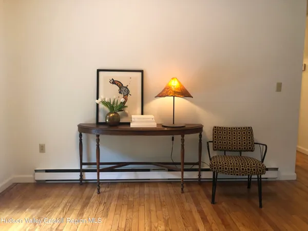 a view of workspace with wooden floor