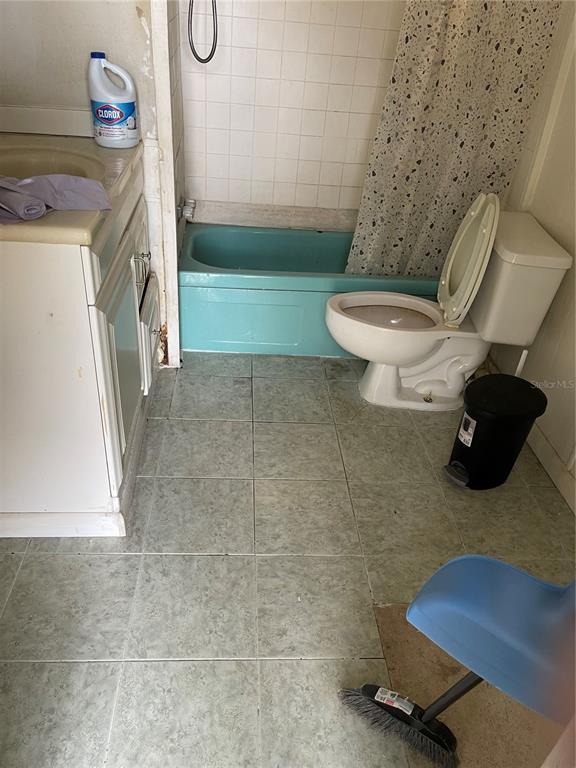 16148 Boca Raton Street Brooksville, FL 34604 - Photo 4 of 7 a bathroom with a toilet and a shower