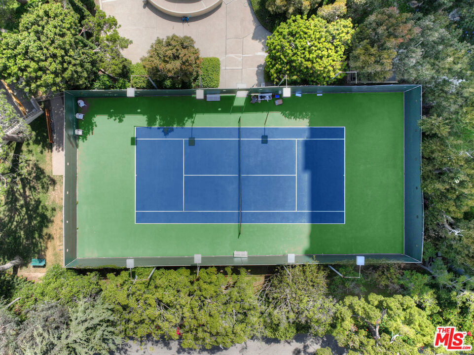 2160 Century Hill, Unit 910 Los Angeles, CA 90067 - Photo 17 of 20 a view of a chair and table in the garden