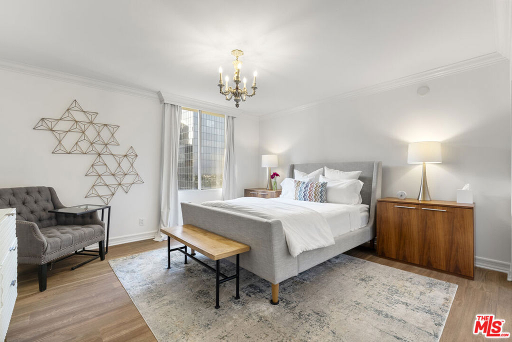 2160 Century Hill, Unit 910 Los Angeles, CA 90067 - Photo 9 of 20 a bed room with a bed and a chair