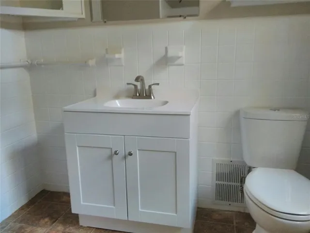 a bathroom with a toilet
