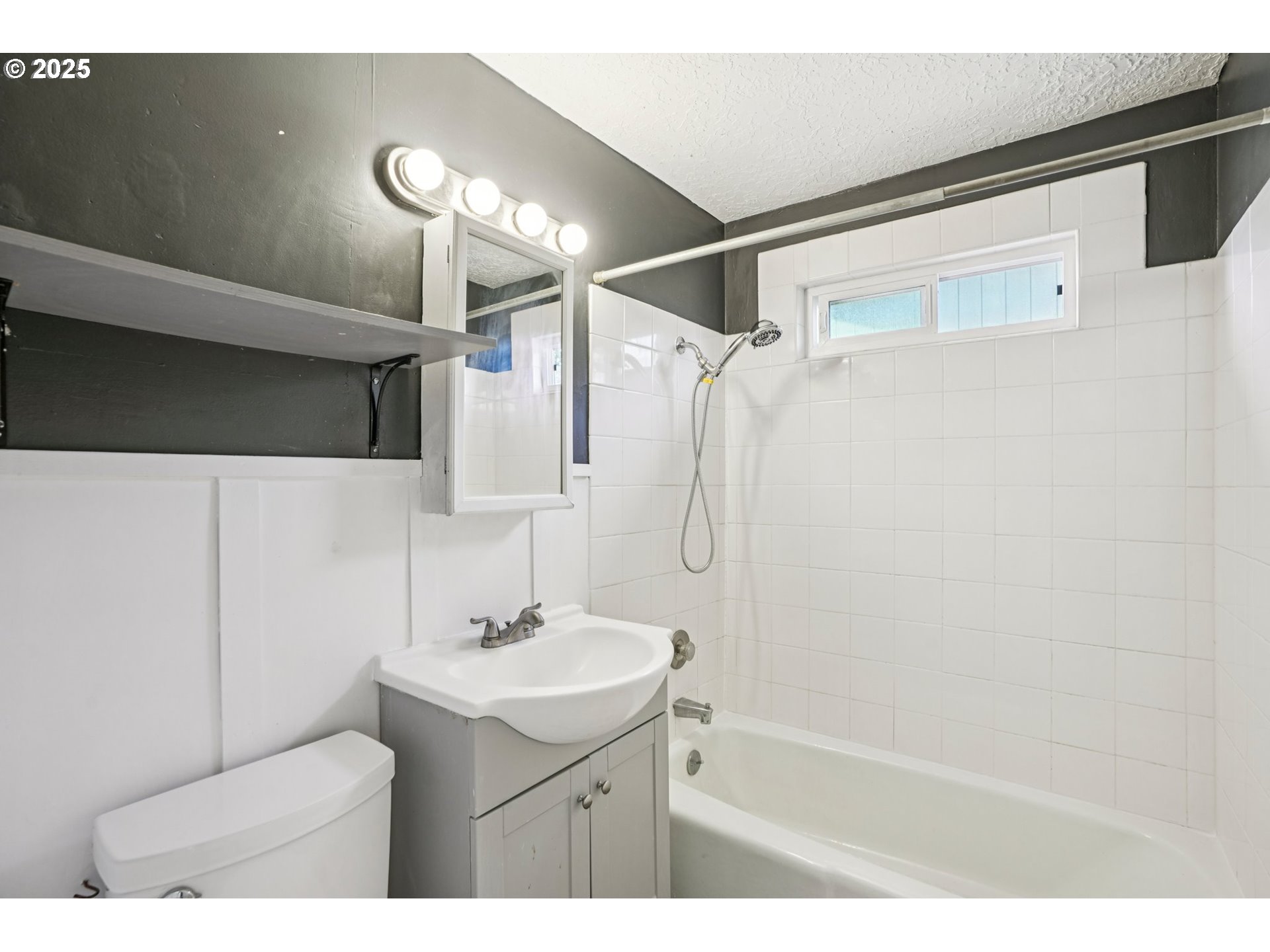1019 Linn Avenue Oregon City, OR 97045 - Photo 14 of 27 a bathroom with a sink mirror toilet and shower