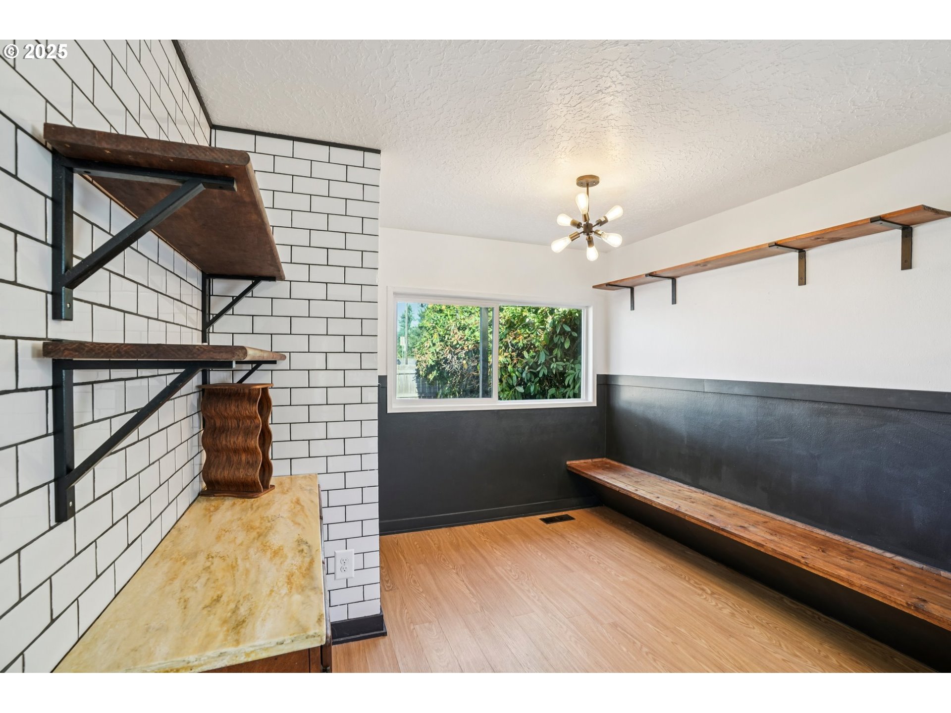 1019 Linn Avenue Oregon City, OR 97045 - Photo 9 of 27 a view of room with window and hardwood floor