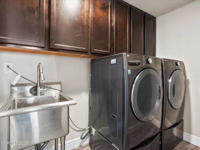 a utility room with cabinets