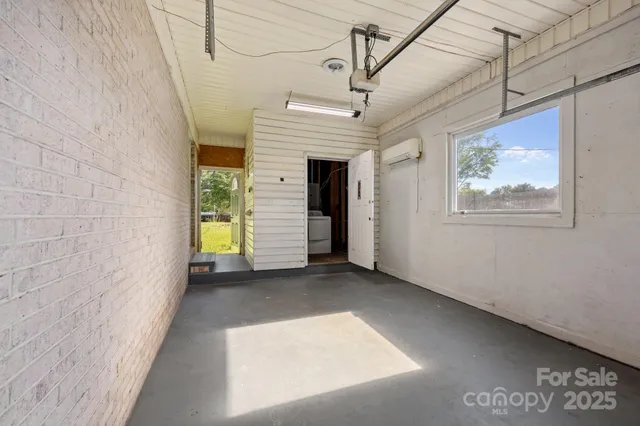 a view of a hallway with a window