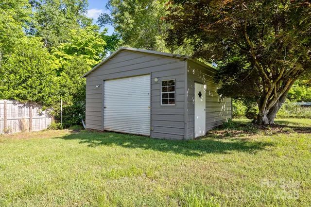 a backyard of a house with lots of green space