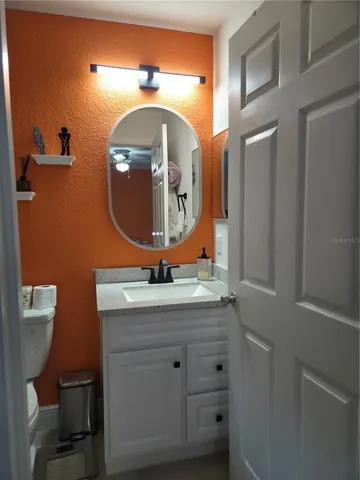 a view of a garage with cars parked