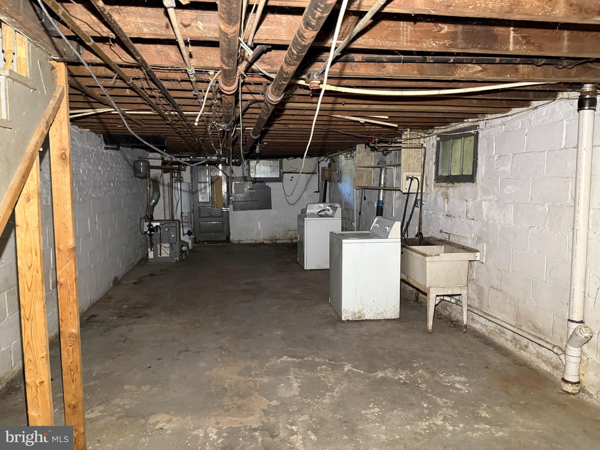 38 North Monastery Avenue Baltimore, MD 21229 - Photo 16 of 17 a view of a storage room with racks on the wall