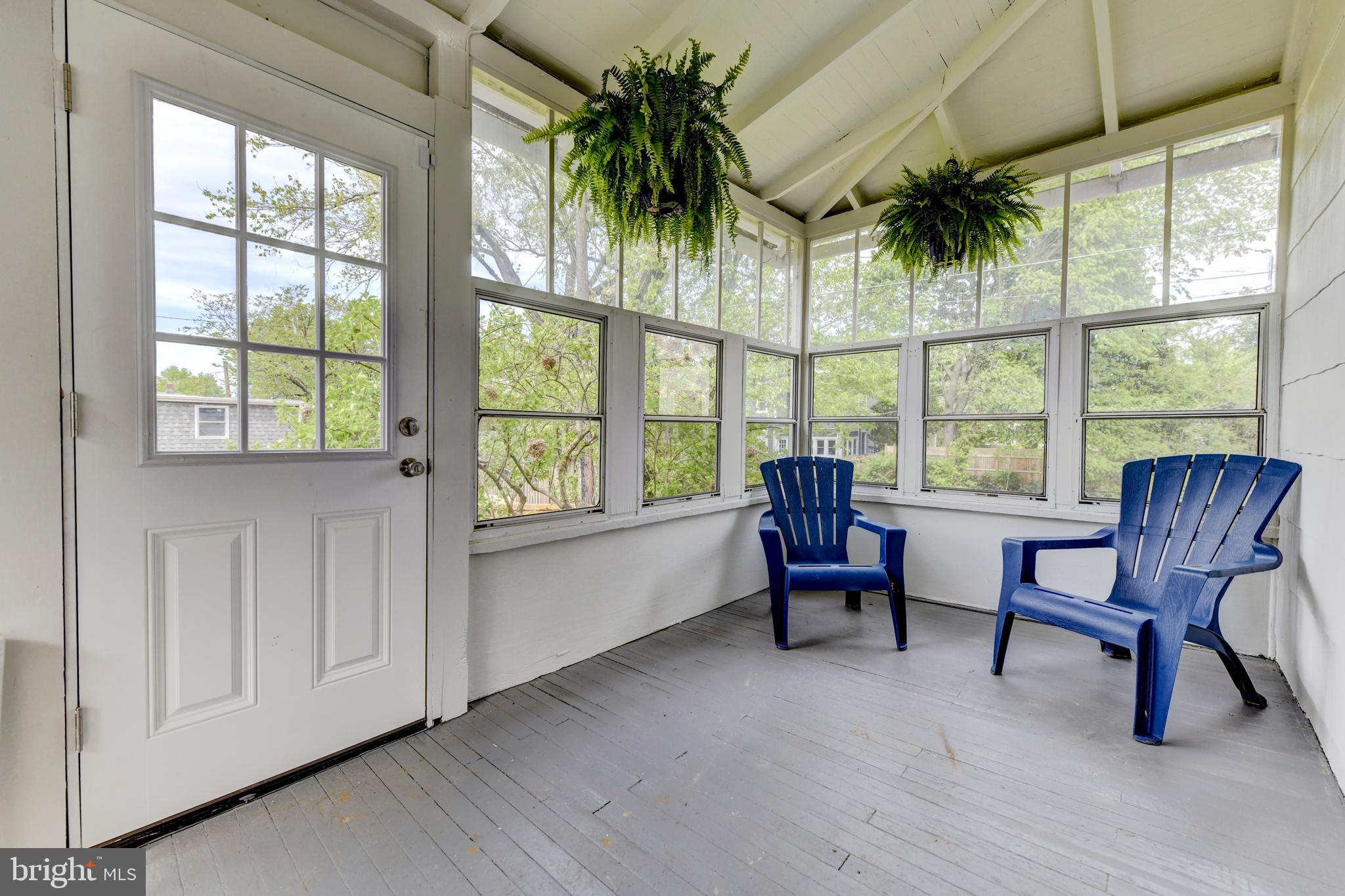 1620 Hamlin Street Northeast Washington, DC 20018 - Photo 17 of 40 Enclosed sun room! Looks out to AMAZING backyard.