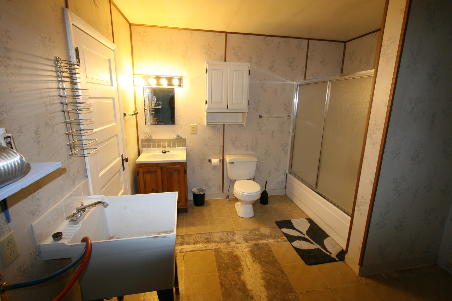 35310 Highway 145 Redvale, CO 81431 - Photo 14 of 38 a bathroom with a sink toilet and shower