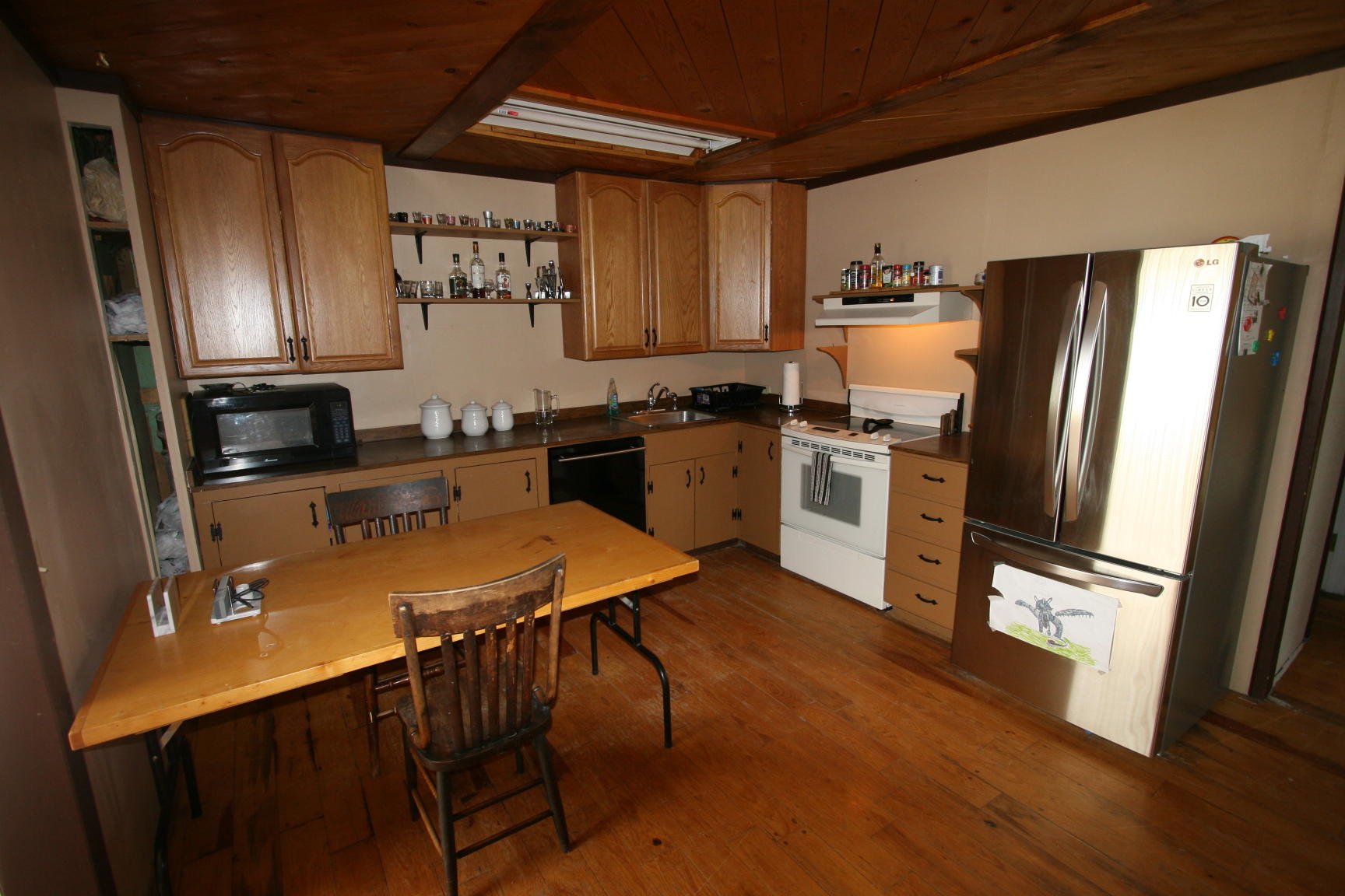35310 Highway 145 Redvale, CO 81431 - Photo 2 of 38 a kitchen with stainless steel appliances granite countertop a refrigerator a stove top oven a sink and dishwasher