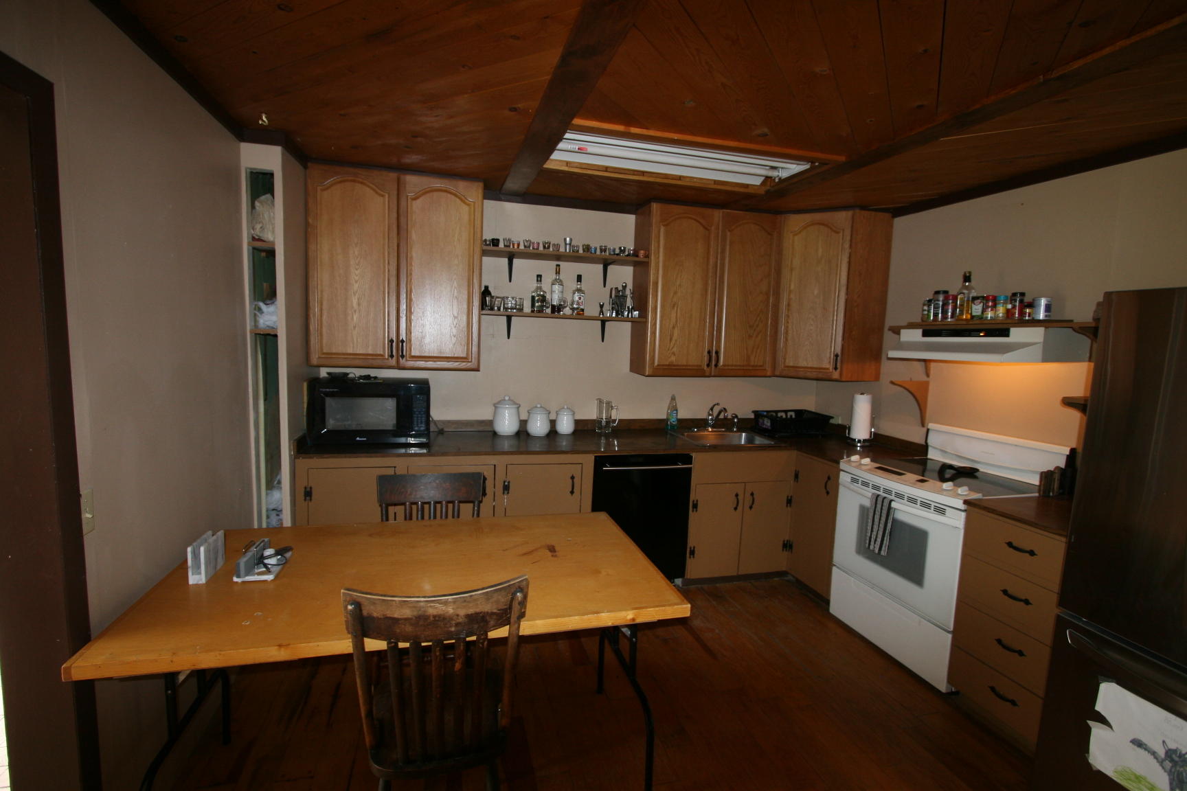 35310 Highway 145 Redvale, CO 81431 - Photo 4 of 38 a kitchen with stainless steel appliances granite countertop a sink stove and refrigerator