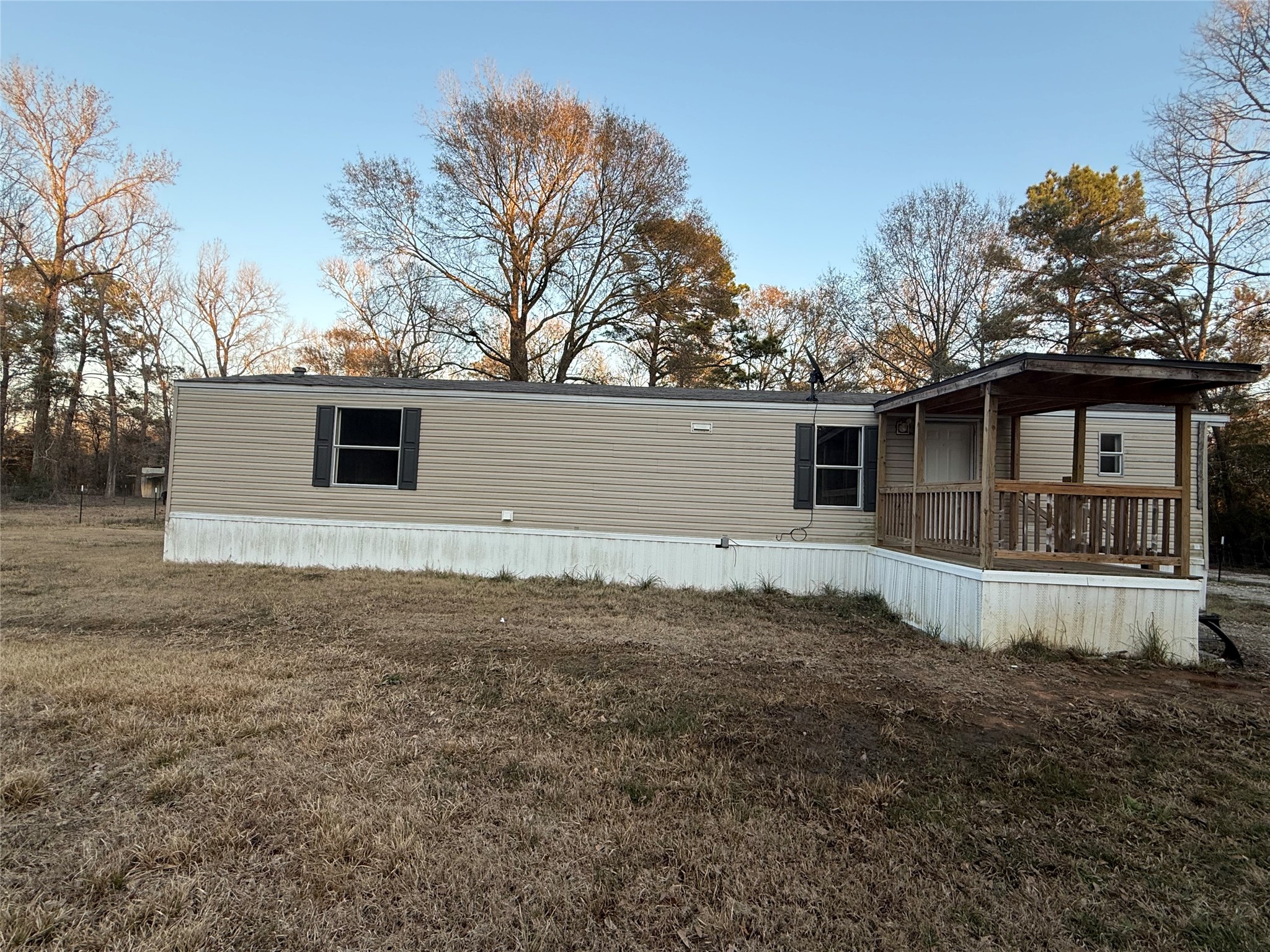 144 Private Road Cleveland, TX 77327 - Photo 16 of 17 a view of a house with a backyard