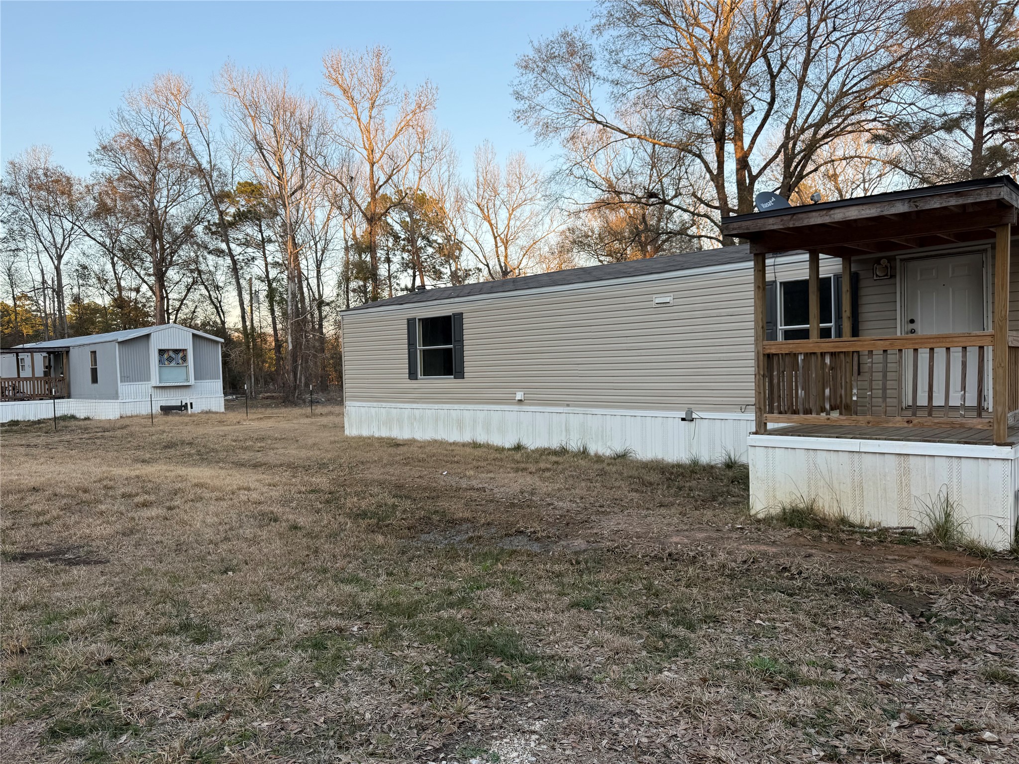 144 Private Road Cleveland, TX 77327 - Photo 17 of 17 a front view of a house with a yard and garage