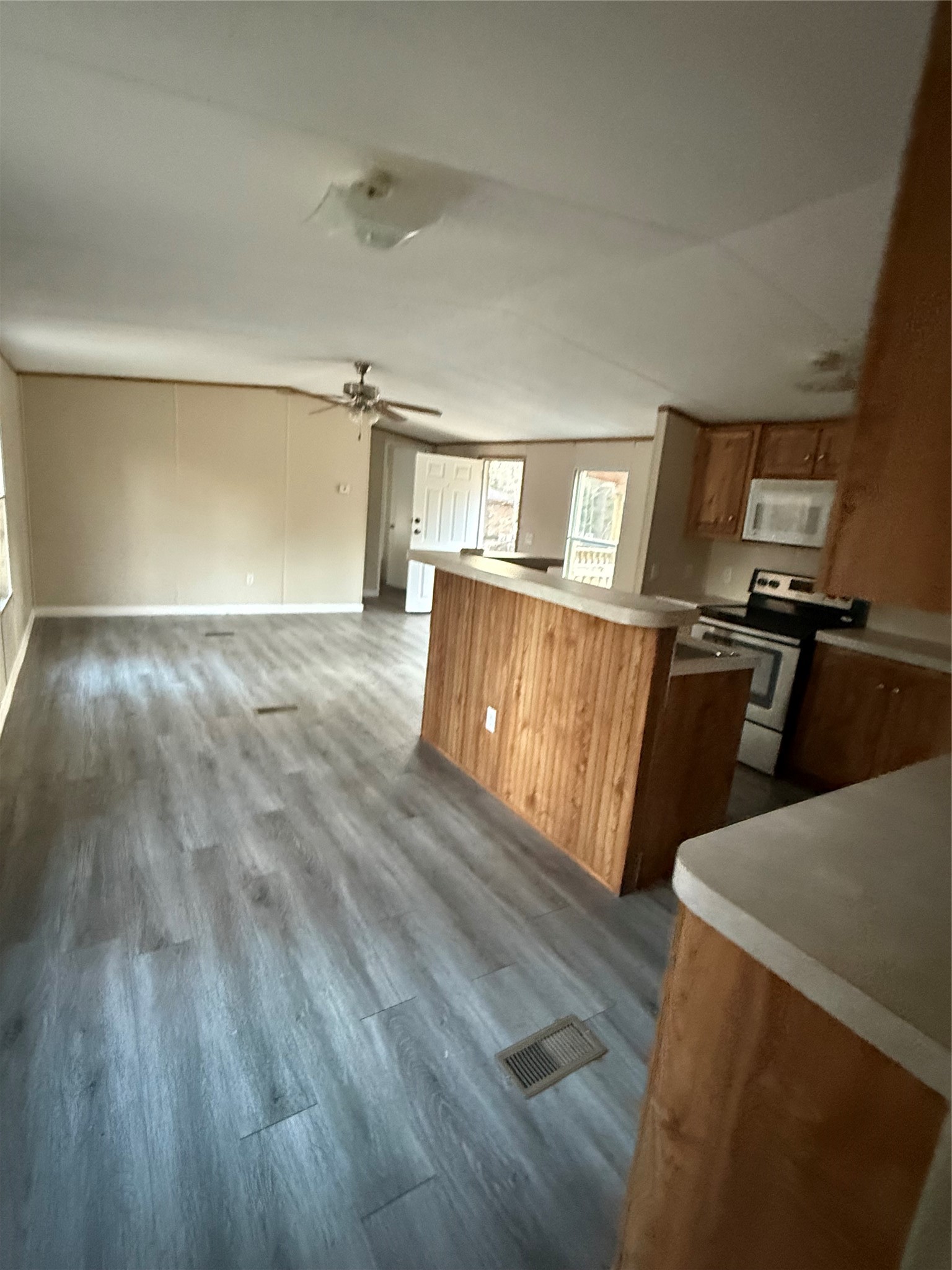 144 Private Road Cleveland, TX 77327 - Photo 5 of 17 a view of a kitchen with wooden floor