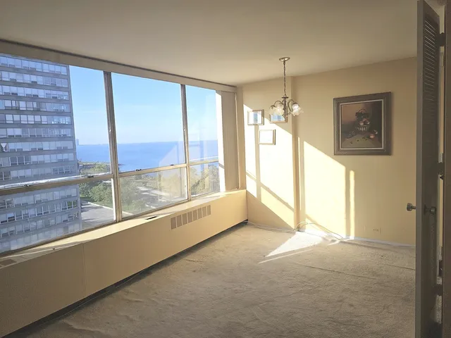 a view of an empty room and window