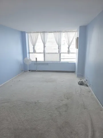 a view of room with walk in closet