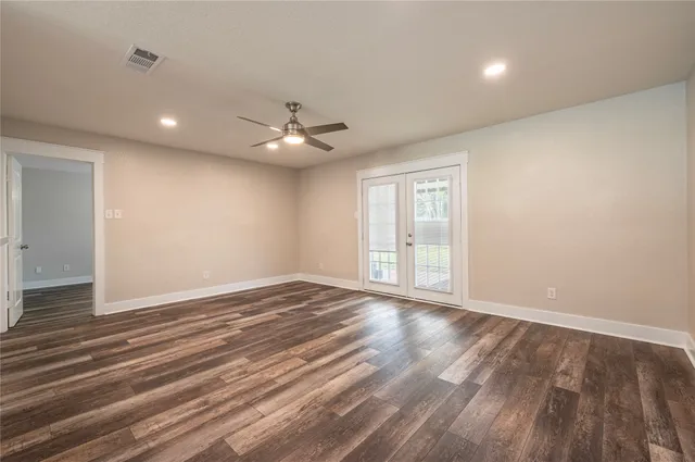 a bathroom with a sink vanity and a mirror