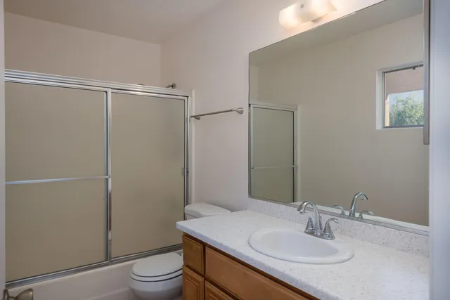 a kitchen with a cabinets and a stove top oven