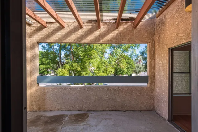 a bathroom with a sink toilet double vanity and shower