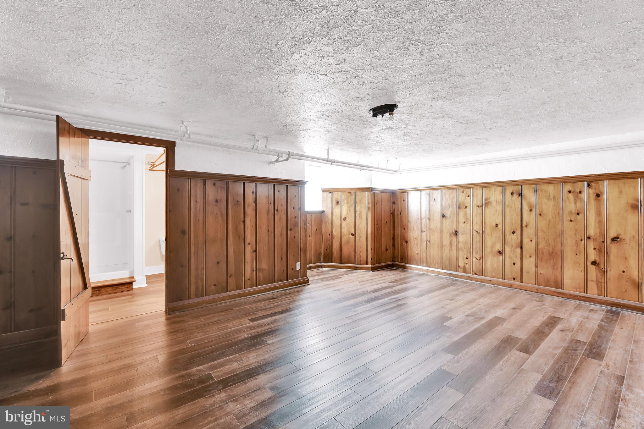1404 Kingsway Road Baltimore, MD 21218 - Photo 22 of 25 Sunlit Basement Family Room