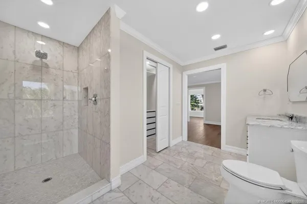 a bathroom with a sink and mirror