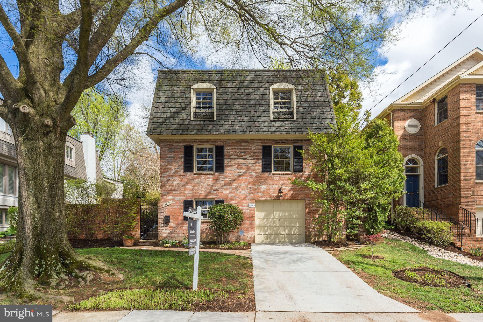 4801 Little Falls Road Arlington, VA 22207 - Photo 1 of 28 a front view of a house with garden