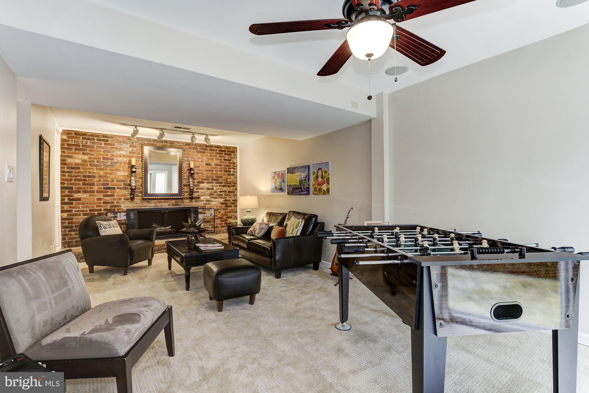 4801 Little Falls Road Arlington, VA 22207 - Photo 17 of 28 a view of a livingroom with furniture and a ceiling fan