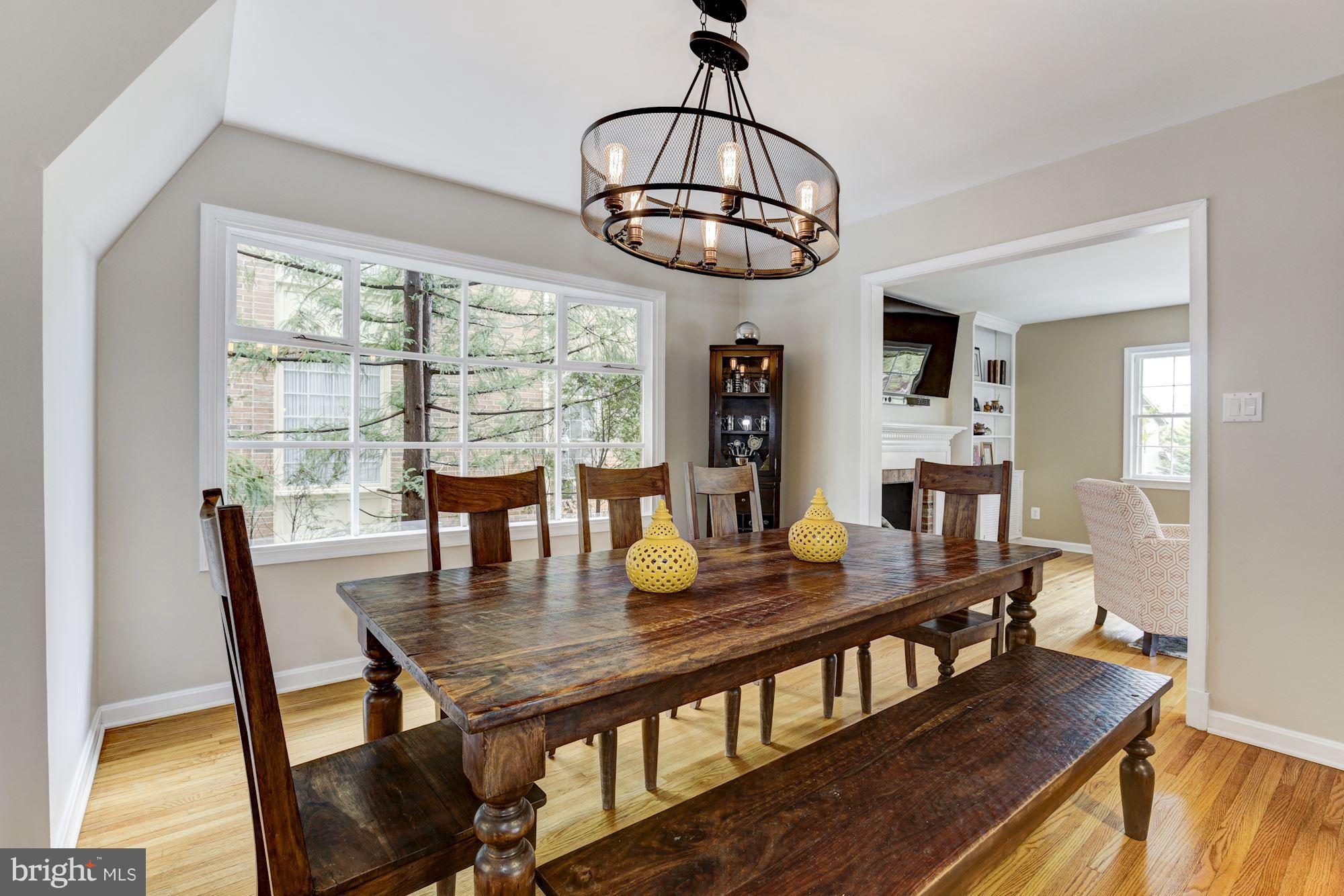 4801 Little Falls Road Arlington, VA 22207 - Photo 6 of 28 a view of a dining room with furniture window and wooden floor