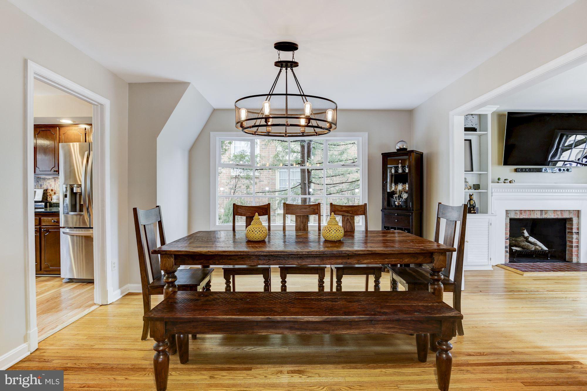 4801 Little Falls Road Arlington, VA 22207 - Photo 7 of 28 a view of a dining room with furniture window and wooden floor