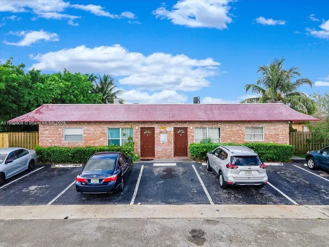 a car parked in front of a house