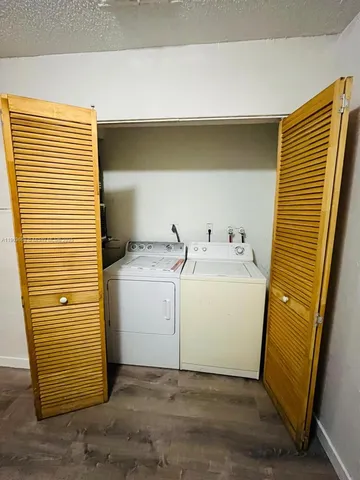 a utility room with a washer and dryer