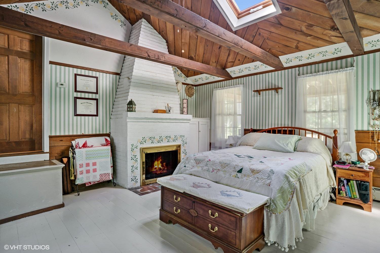 16 Pimlico Pond Road Forestdale, MA 02644 - Photo 5 of 10 a living room with furniture and a fireplace