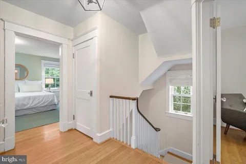 a view of a bedroom from a hallway