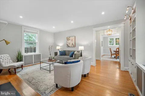 a living room with furniture and a table