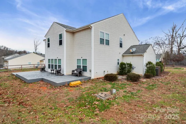 a view of a swimming pool with a yard