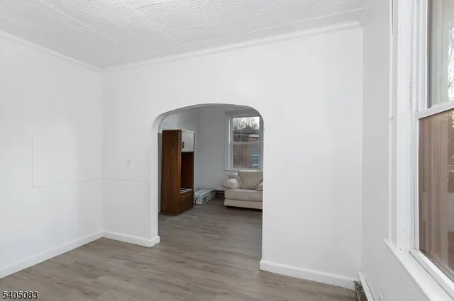 a bathroom with a sink a mirror and a shower