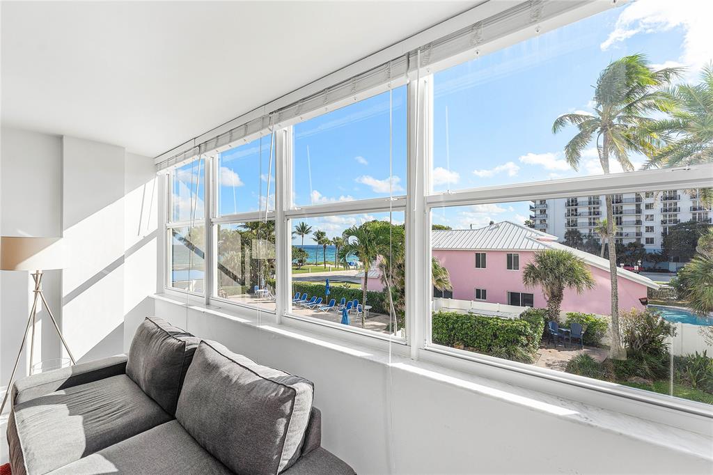800 Southeast 20th Avenue, Unit 206 Deerfield Beach, FL 33441 - Photo 11 of 37 a living room with furniture