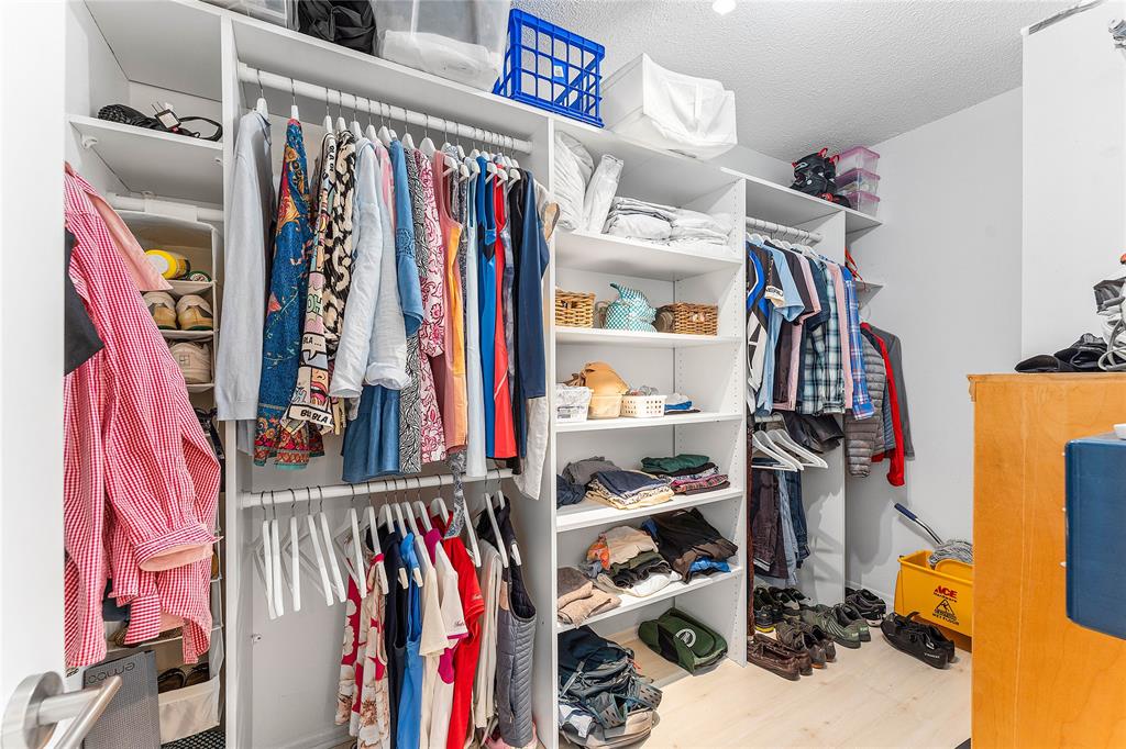 800 Southeast 20th Avenue, Unit 206 Deerfield Beach, FL 33441 - Photo 19 of 37 a view of walk in closet with clothes