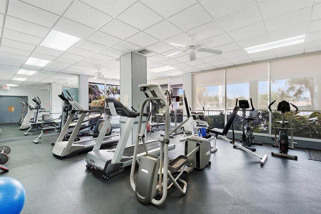 800 Southeast 20th Avenue, Unit 206 Deerfield Beach, FL 33441 - Photo 24 of 37 a view of a room with gym equipment