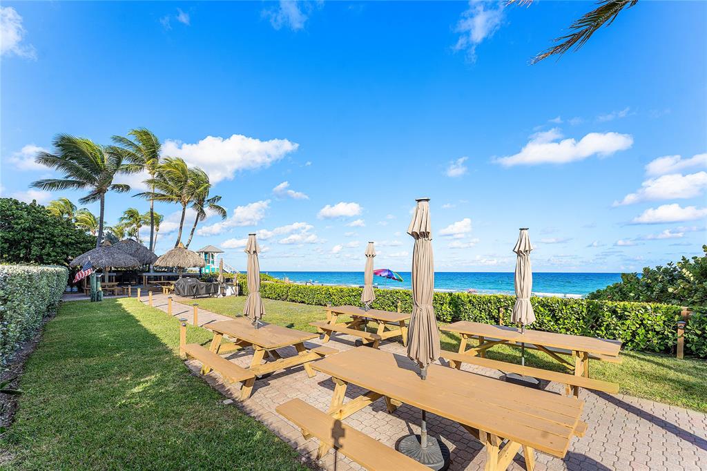 800 Southeast 20th Avenue, Unit 206 Deerfield Beach, FL 33441 - Photo 28 of 37 a view of a patio with swimming pool