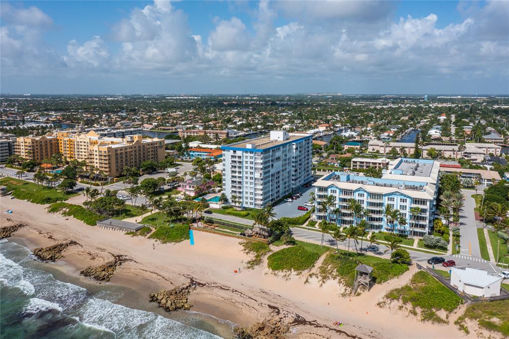 800 Southeast 20th Avenue, Unit 206 Deerfield Beach, FL 33441 - Photo 37 of 37 an aerial view of residential building and lake view