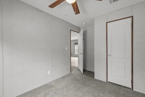 an empty room with a bathroom