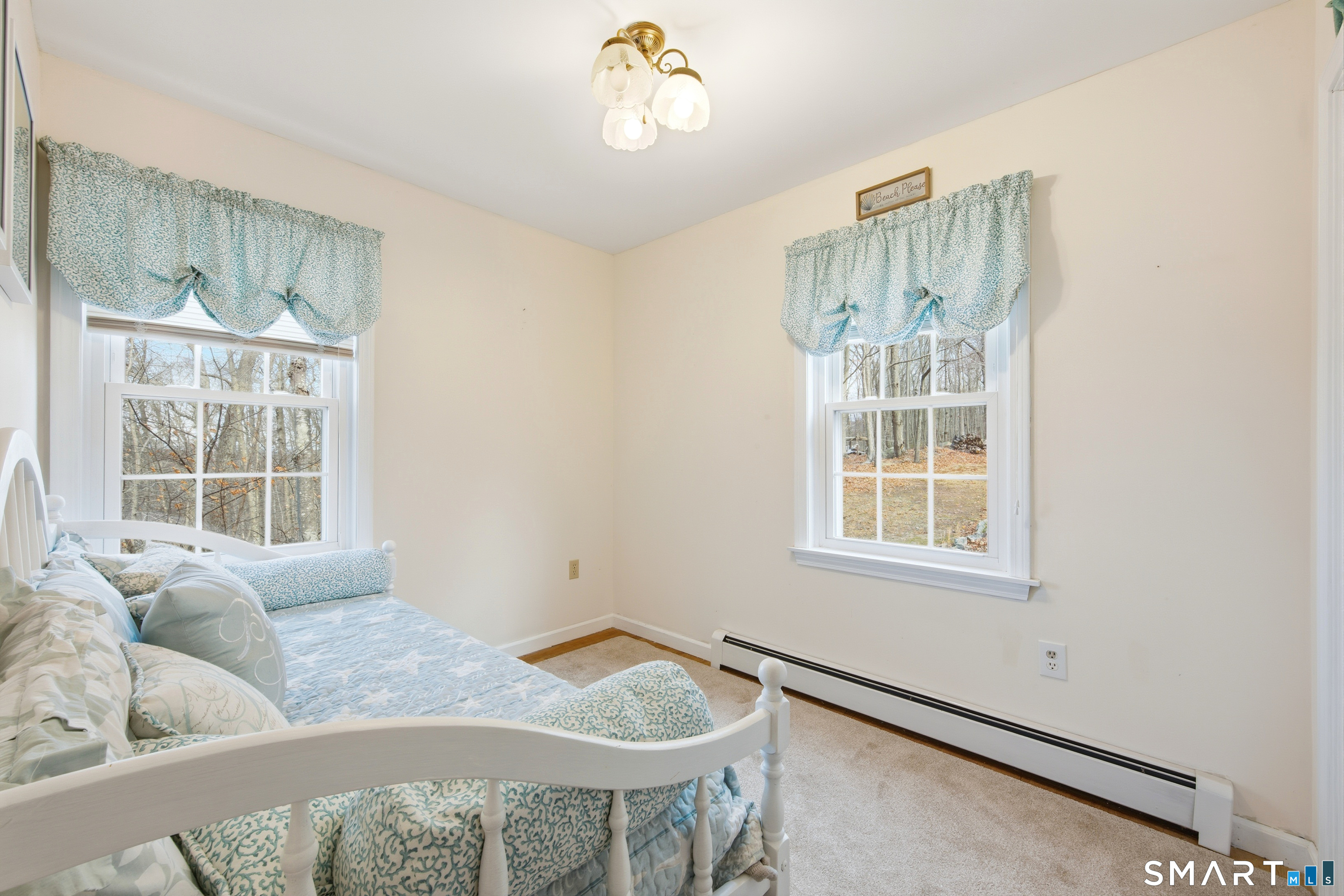 48 Bittersweet Drive Ledyard, CT 06335 - Photo 18 of 38 a living room with furniture and a window