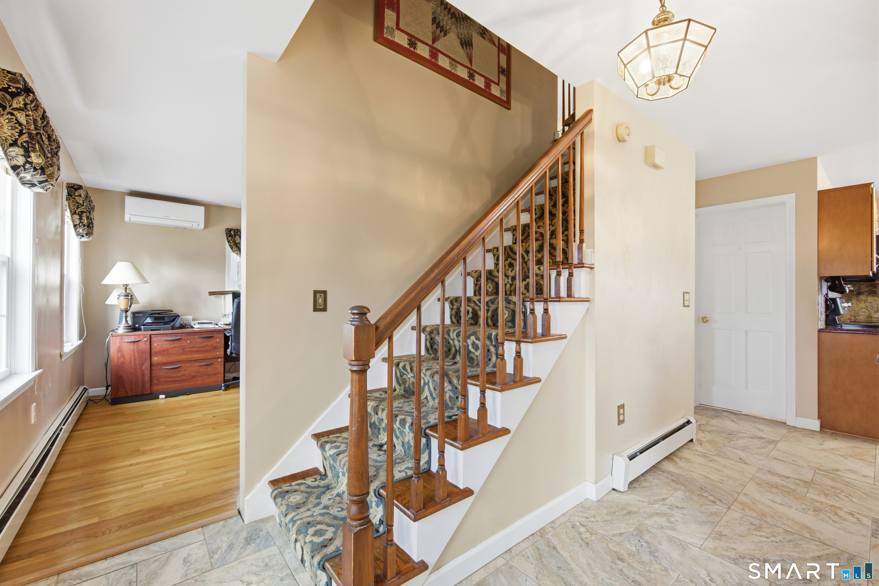 48 Bittersweet Drive Ledyard, CT 06335 - Photo 21 of 38 a view of entryway and hall with wooden floor