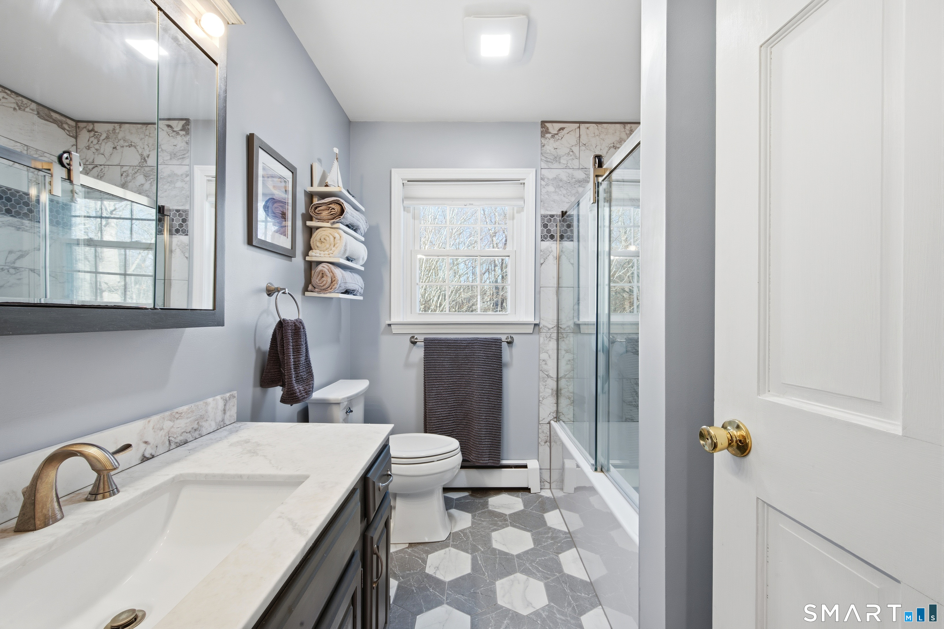 48 Bittersweet Drive Ledyard, CT 06335 - Photo 32 of 38 a bathroom with a sink toilet and shower