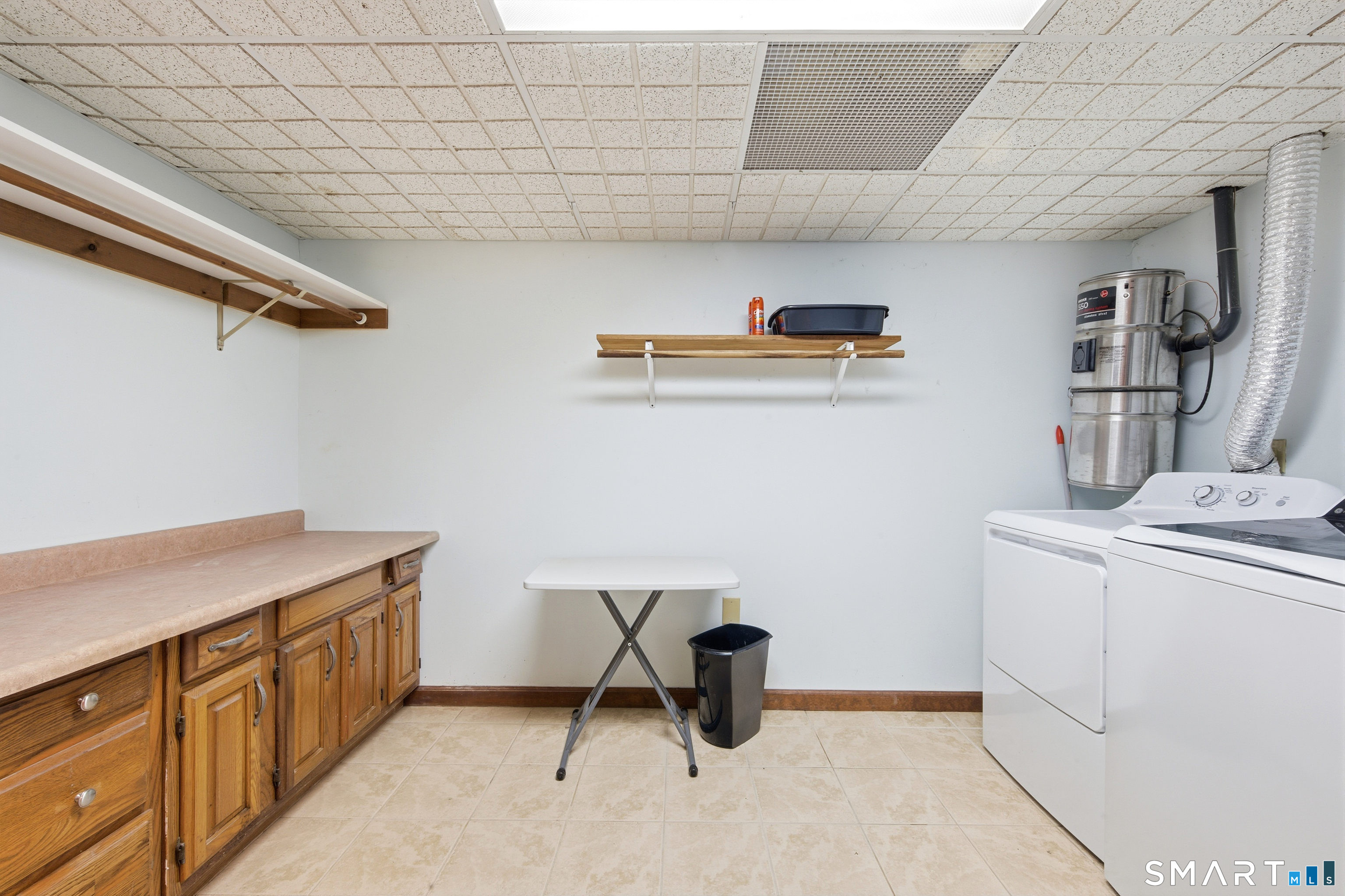 48 Bittersweet Drive Ledyard, CT 06335 - Photo 35 of 38 a room with storage and utility