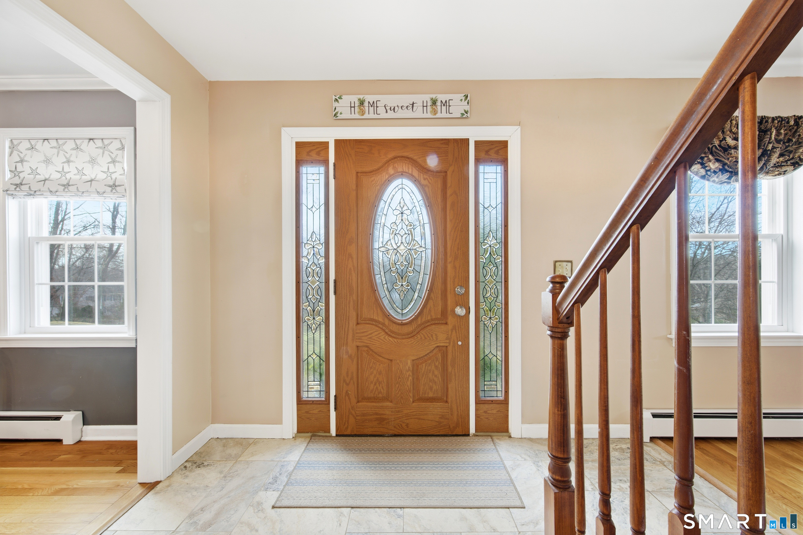 48 Bittersweet Drive Ledyard, CT 06335 - Photo 8 of 38 a view of door with stairs