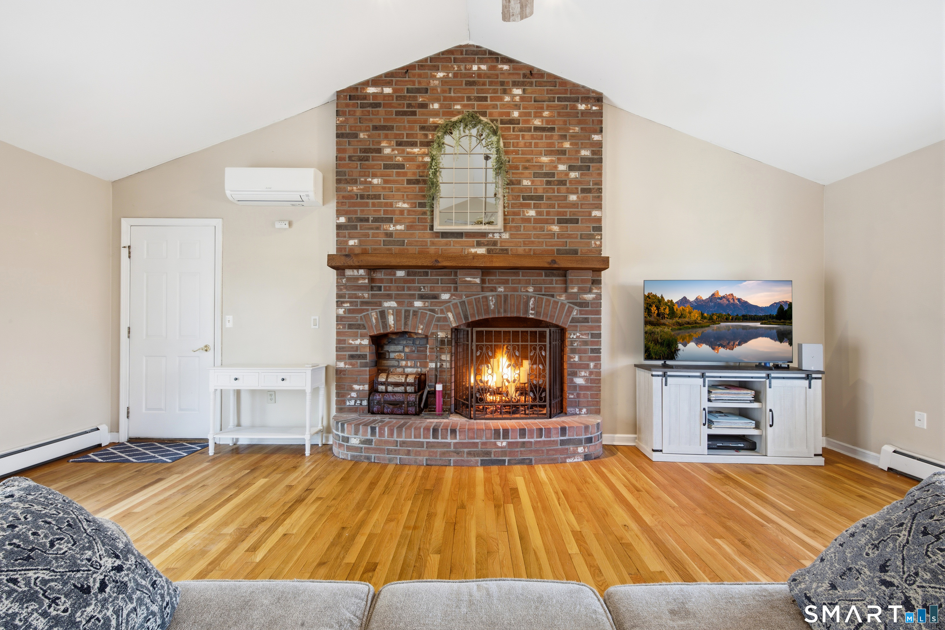 48 Bittersweet Drive Ledyard, CT 06335 - Photo 10 of 38 a living room with furniture and a fireplace